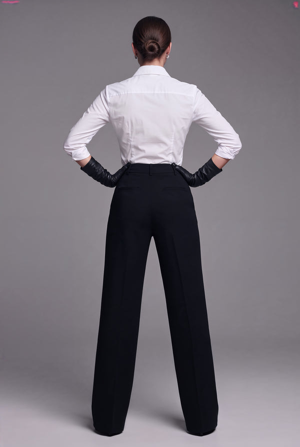 Aveline black wide-leg pants with rear welt pockets, back view