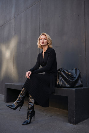 Celestine black belted knit midi dress, side view