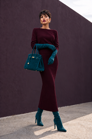 Deep wine burgundy knitted blouse and vertical ribbed skirt detail