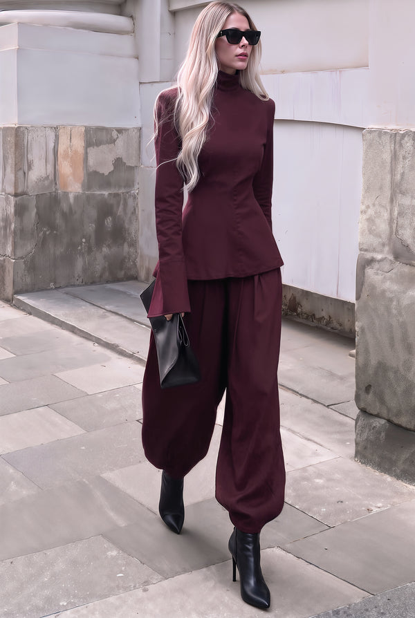 Metropolis Bordeaux set with sculpted jacket and wide-leg trousers, side view