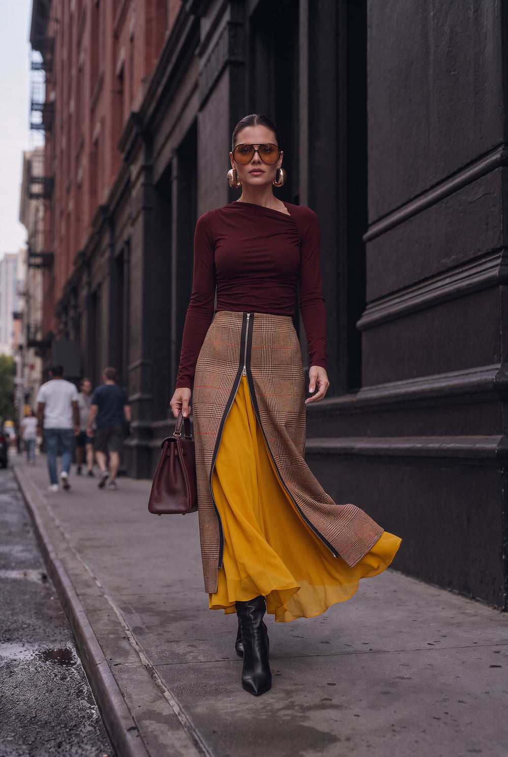 Brown checked tweed and mustard draped fabric detail